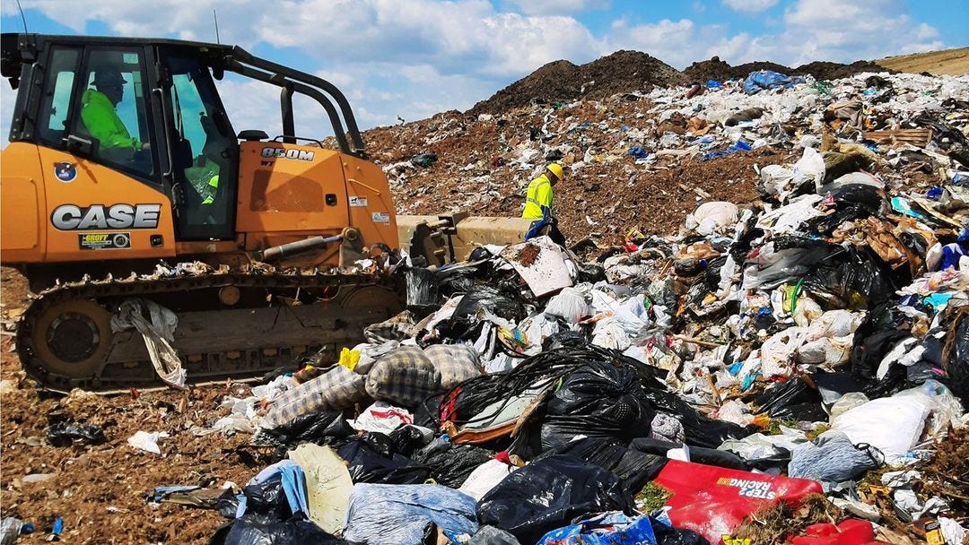 Sanitation workers dig through landfill to find woman's lost wedding ring