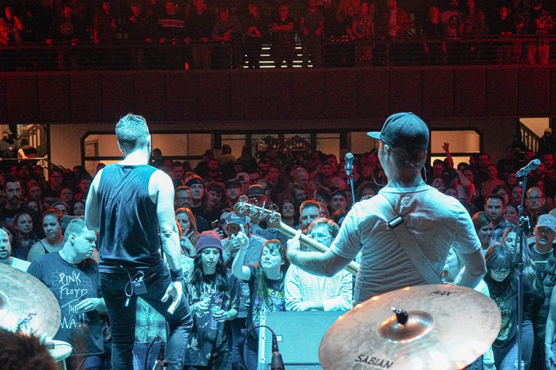 Pike's band plays to a crowd