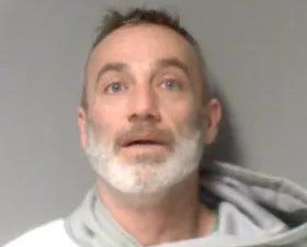A 49-year-old who admitted to calling in a bomb threat to the state capitol was sentenced to 365 days in jail, authorities announced on Wednesday.