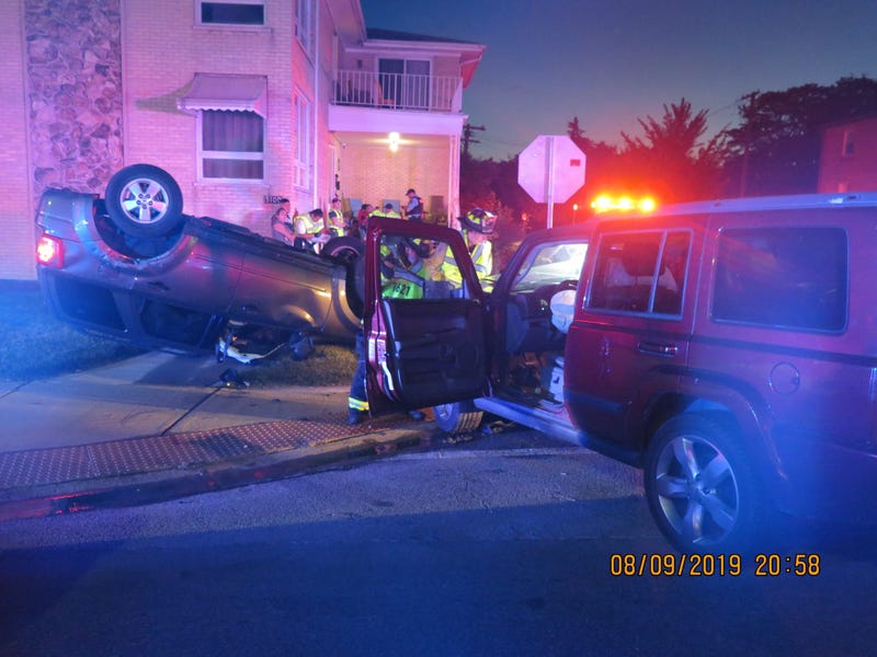 Riverside authorities investigate a rollover crash that sent an entire family to a hospital on Aug. 9, 2018. 