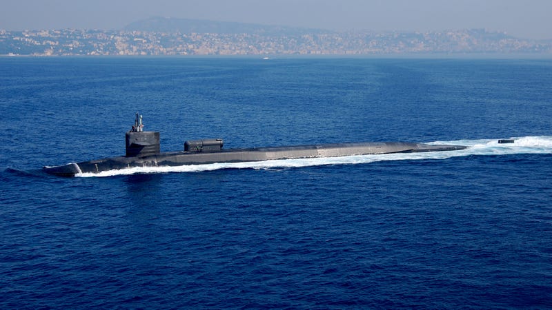 Iran tests missiles under apparent watch of U.S. nuclear sub