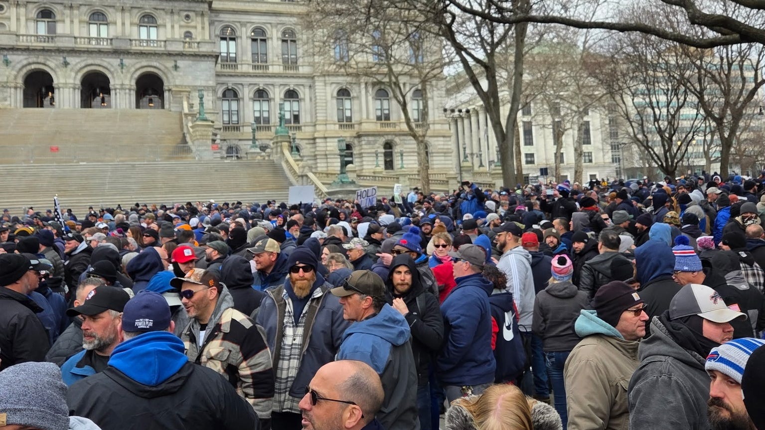 Thousands rally at state capitol as corrections officers strike enters Week 3