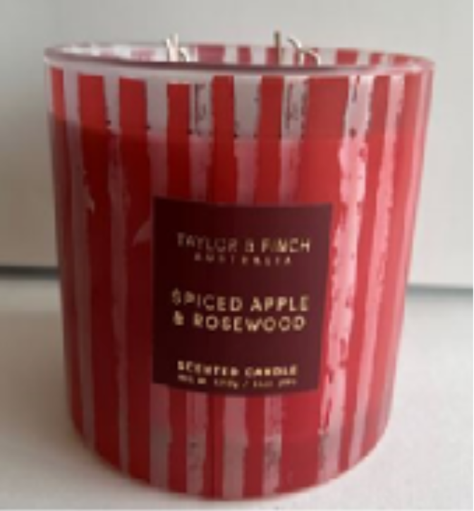 The Spiced Apple & Rosewood scented candle sold by Ross. 