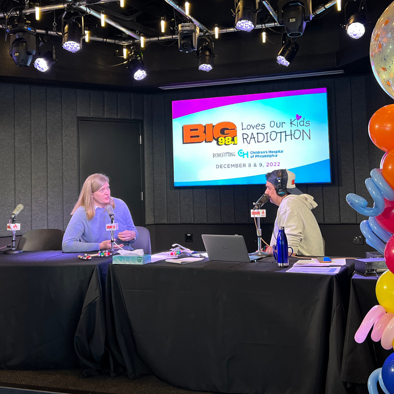 Elana Brewer, Senior Director of Child Life at CHOP with Coop at 21st Annual BIG 98.1 Loves Our Kids Radiothon
