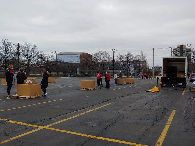Volunteers collected personal protective equipment for those on the front lines of the coronavirus epidemic during a drive outside the United Center this afternoon.