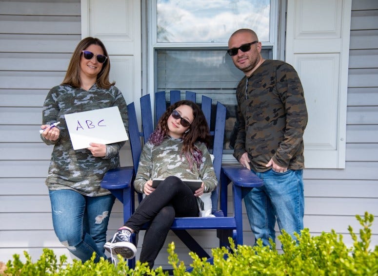 “Porch-trait” of Jaime Dutkin’s family.