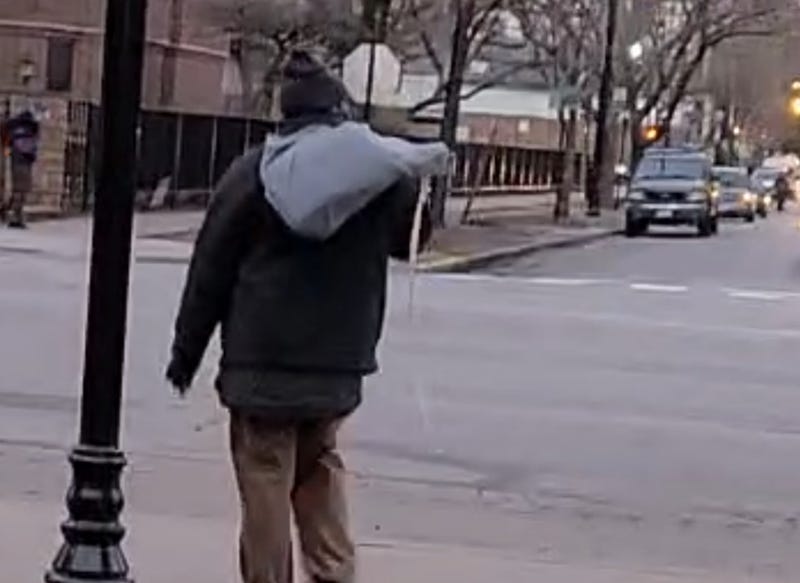 A would be package thief meets his match in downtown Chicago after some apartment building residents chase him down.
