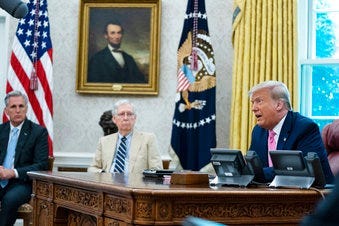 President Donald Trump speaks during a meeting with Senate Majority Leader Mitch McConnell of Ky., and House Minority Leader Kevin McCarthy of Calif., in the Oval Office of the White House, Monday, July 20, 2020, in Washington. (AP Photo/Evan Vucci)