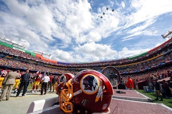 FILE - In this Sept. 18, 2016, file photo, F-26 fighter jets from the DC Air National Guard fly over FedEx Field before an NFL football game against between the Washington Redskins and the Dallas Cowboys in Landover, Md. (AP Photo/Nick Wass, File)