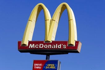 FILE - This Oct. 17, 2019 file photo shows a McDonald's sign along Interstate 40/85 in Burlington, N.C. (AP Photo/Gerry Broome, File)