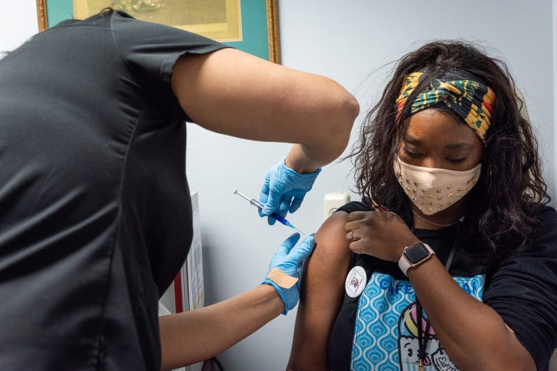 A PREVENT-19 phase 3 trial volunteer receives the vaccine at Research Your Health in Plano, Texas.