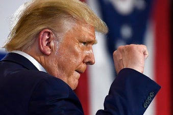 President Donald Trump pumps his fist as he finishes speaking during an event at the Whirlpool Corporation facility in Clyde, Ohio, Thursday, Aug. 6, 2020. (AP Photo/Susan Walsh)