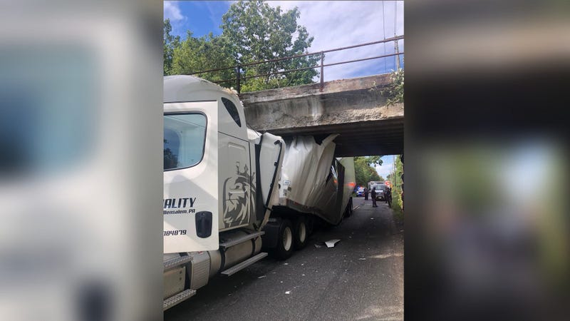 A tractor-trailer that got stuck under a bridge Tuesday on Fleming Pike.