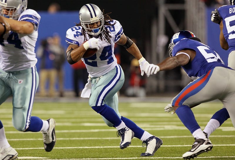 Marion Barber #24 of the Dallas Cowboys runs the ball against the New York Giants on November 14, 2010 at the New Meadowlands Stadium in East Rutherford, New Jersey. The Cowboys defeated the Giants 33-20.
