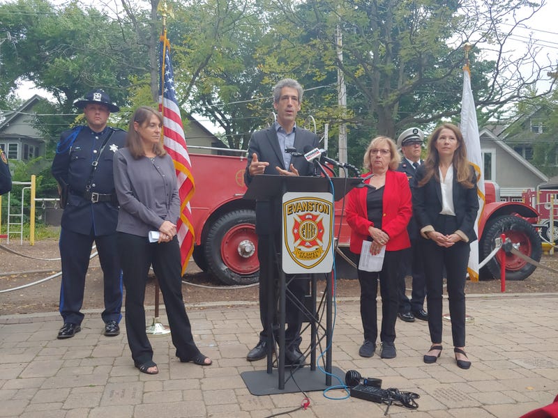Mayor Daniel Biss speaks at an Evanston Fire Department podium