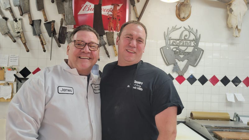Jim LeGrand Sr. and Jr. behind the counter at their St. Louis Hills market and deli