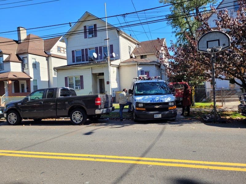 Police investigated outside the home on Heberton Avenue in Port Richmond after a woman's body was discovered in a storage bin earlier in the day