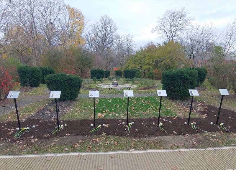 A temporary memorial honoring victims of the Highland Park Fourth of July Parade shooting has been located in the Rose Garden next to Highland Park City Hall since 2022. Now, the location is one of three possible sites for the permanent memorial.