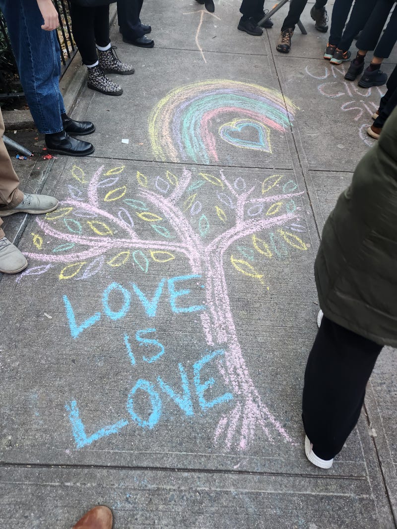A chalk drawing on the ground outside the library on Thursday.