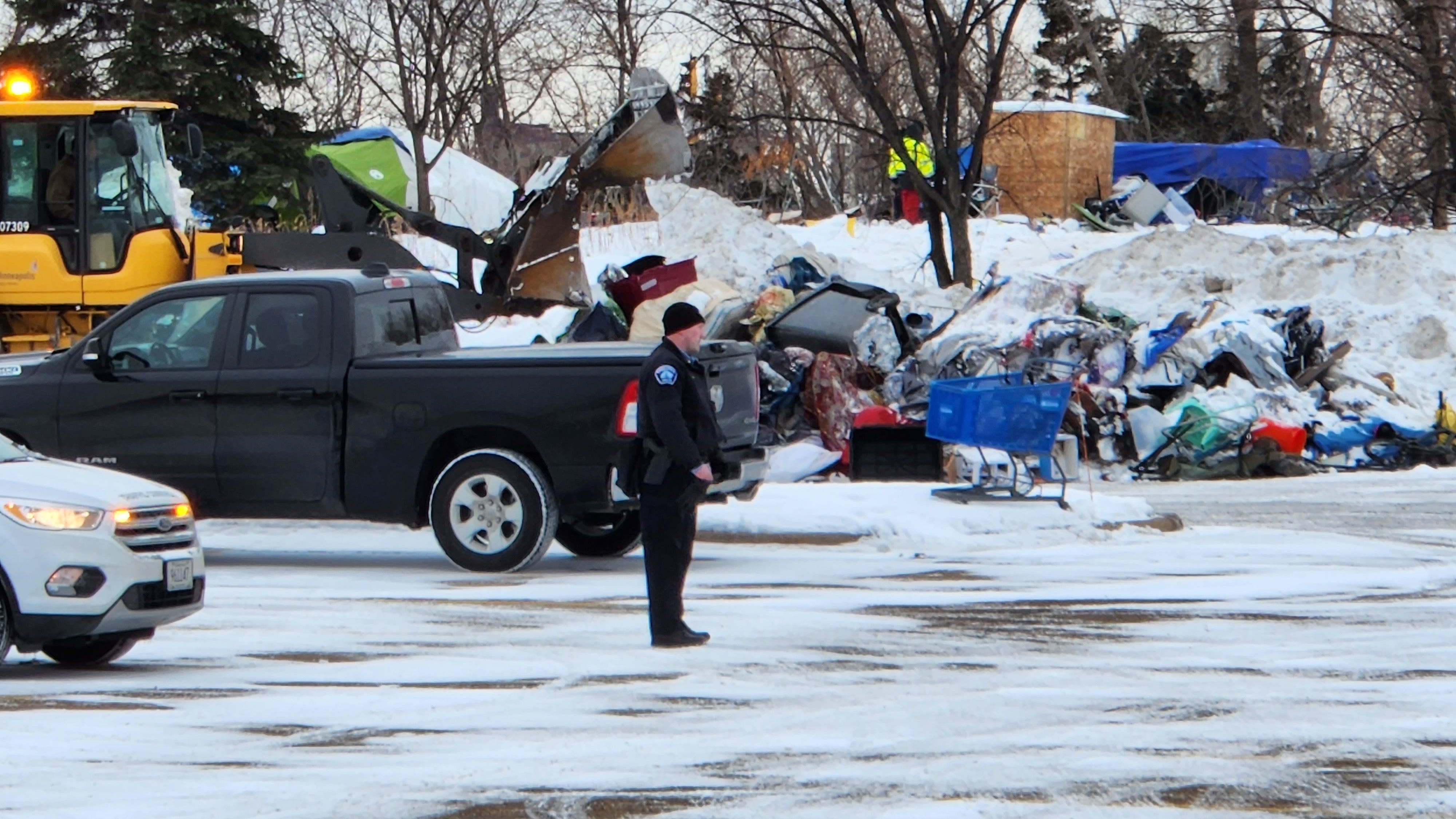 Minneapolis begins clearing out homeless encampment near Quarry Center