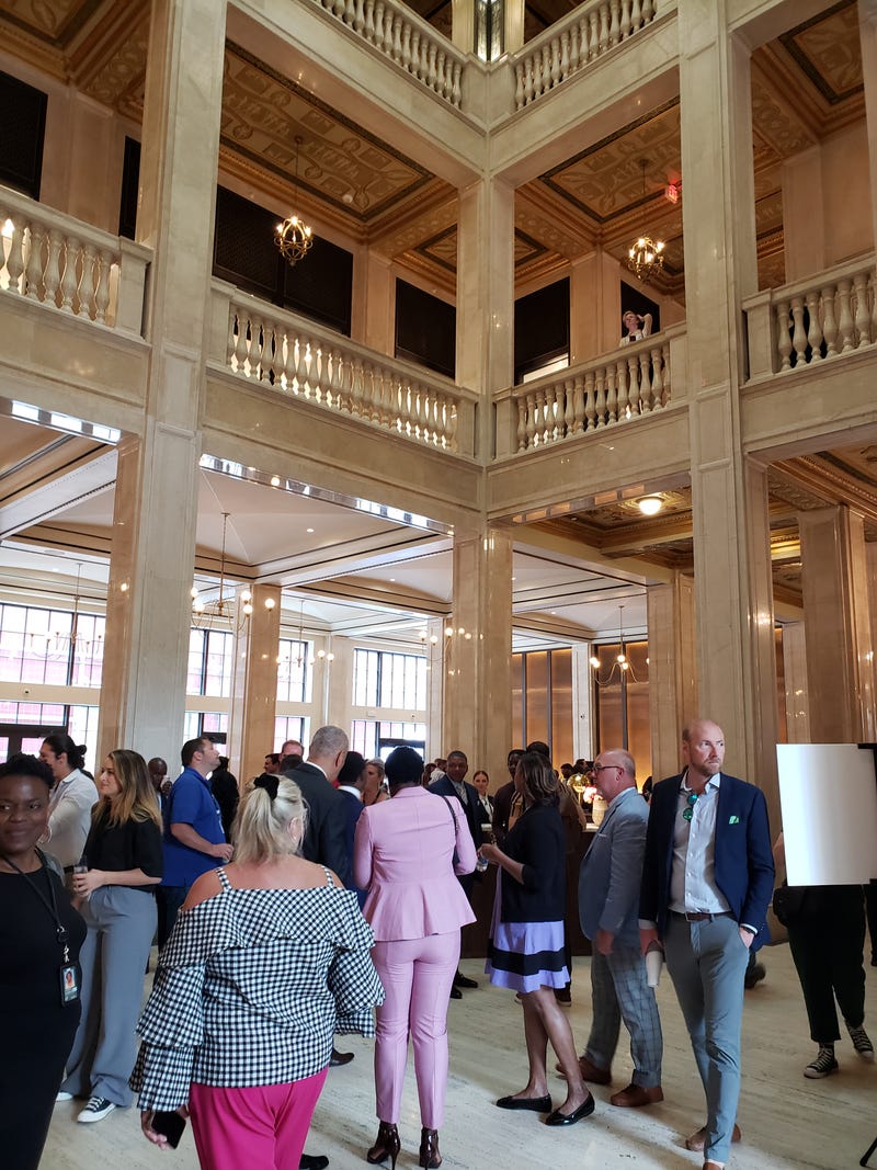 People inside Book Tower after ribbon cutting ceremony