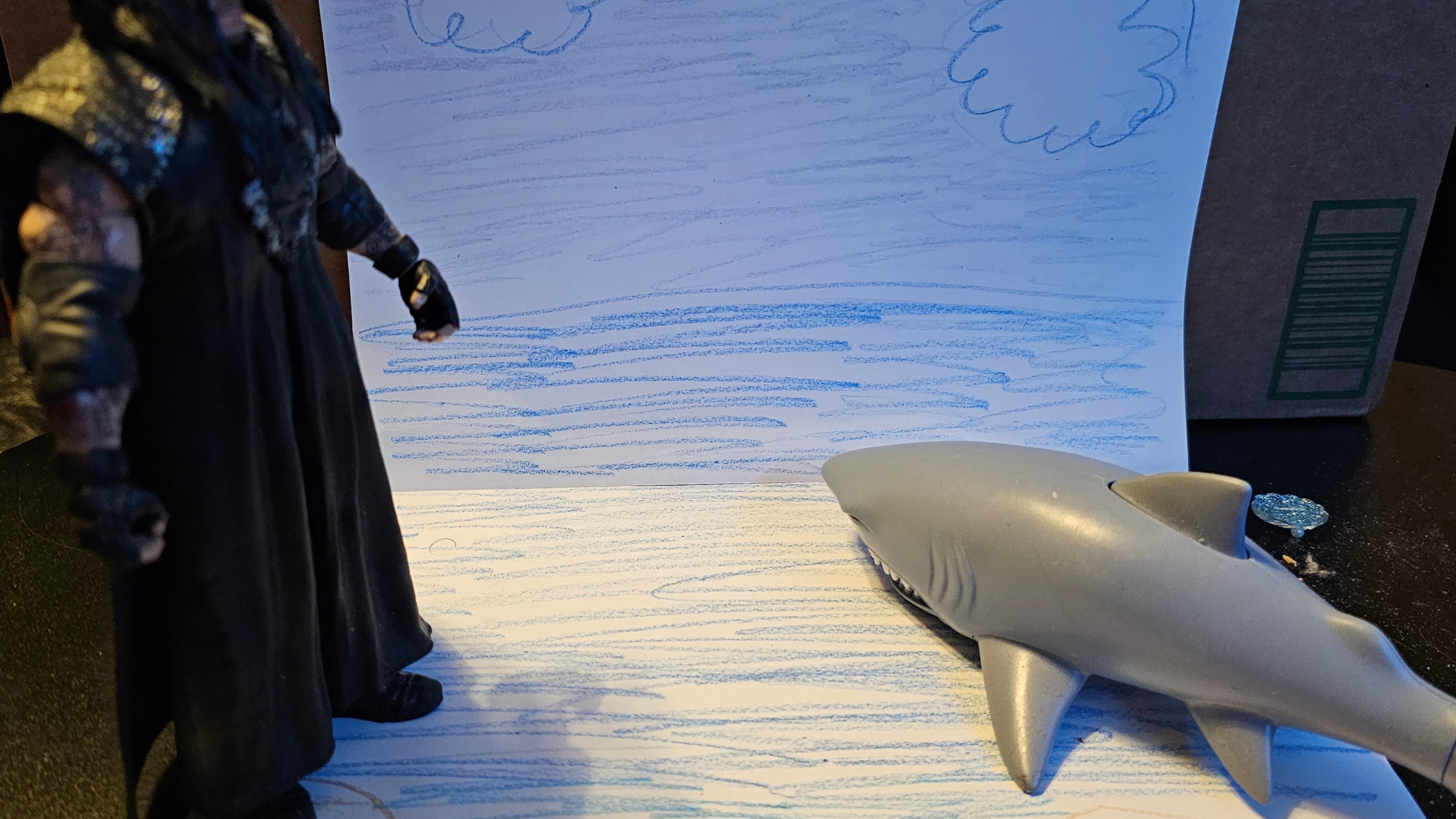 Retired wrestler The Undertaker still fearsome enough to back down a shark