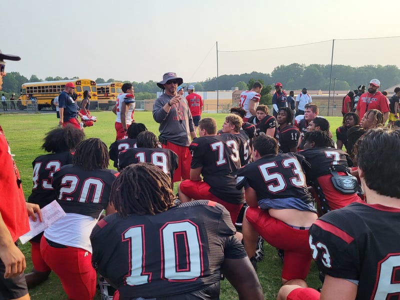 Cedartown Bulldogs head coach Jamie Abrams speak with team