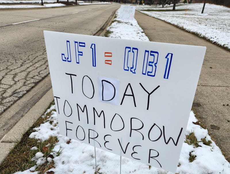 Fans put up signs calling for the Bears to bring back quarterback Justin Fields, whose future with the team is uncertain.