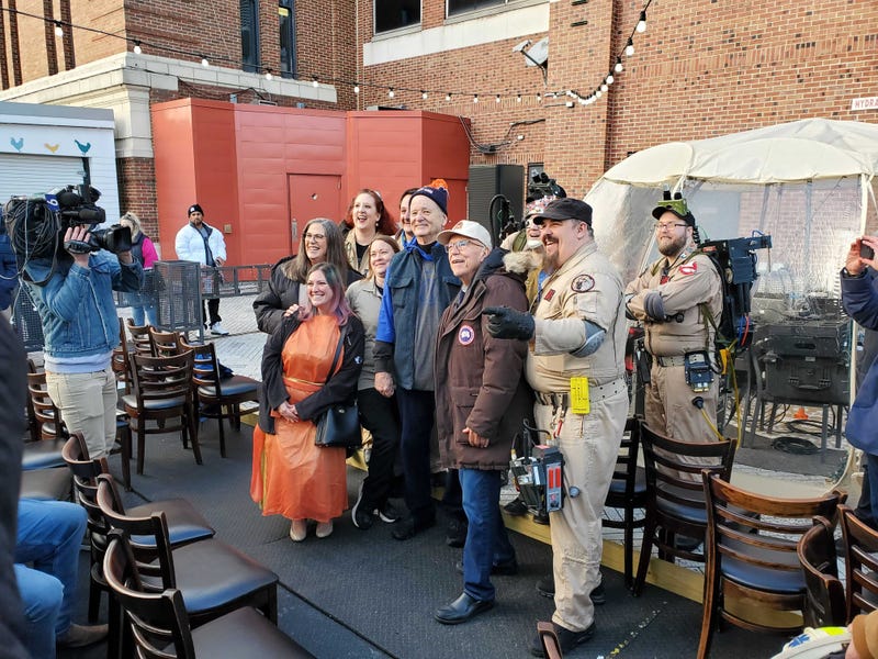 At suburban Woodstock's Groundhog Day celebration, Tom Skilling (front, second from the right) poses for a photo with actor Bill Murray and several others.