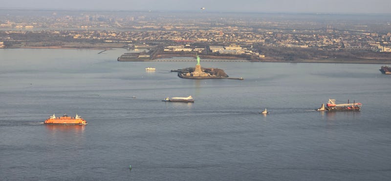 The Concorde is seen near the Statue of Liberty on March 14, 2024