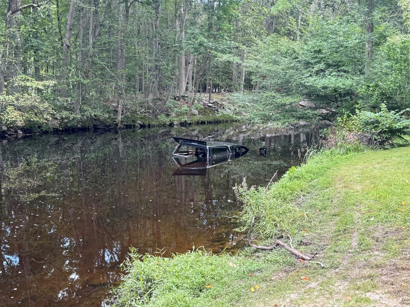 Vehicle submerged in the Aspetuck River on Thursday, Aug. 22, 2024.