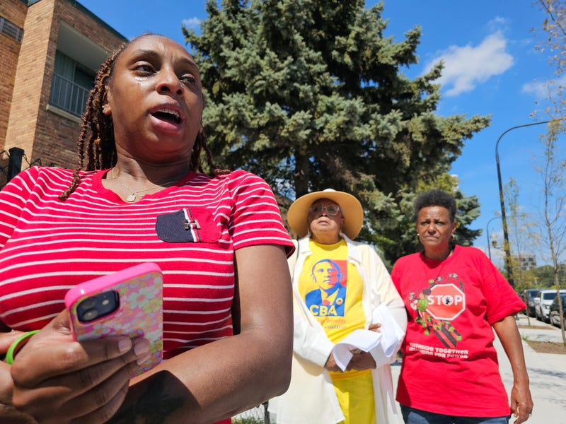 A coalition of Chicagoans from South Shore, Hyde Park and Woodlawn spoke out Thursday about rising housing costs that they say have priced out longtime residents. Here, Stephanie Curry speaks to reporters while Hattie Knazze (center) and Christiana Powell (right) look on.