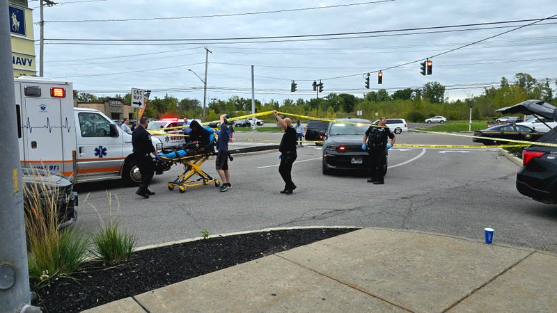 Suspect loaded into ambulance