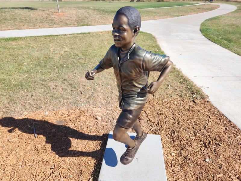 A memorial and statue honoring a 10-year-old boy who was killed by his own father back in 2015 was installed Friday morning at Becker Park in Crystal.