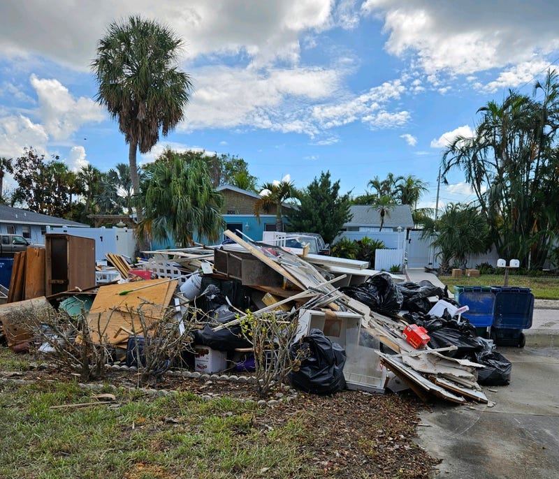 garbage piled up after storm