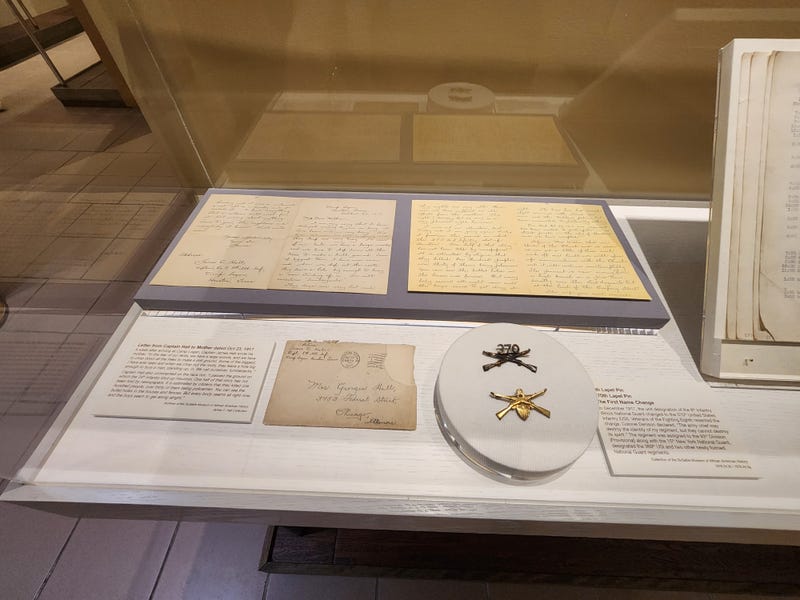 archived letter and lapels on display at DuSable Black History Musuem