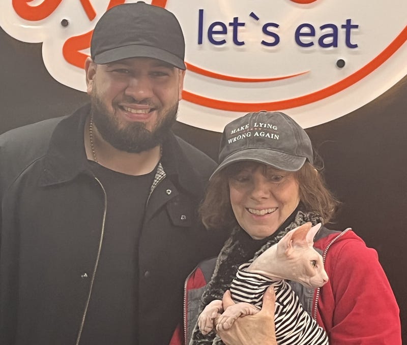 Ronnette Riley was reunited with her cat Eilee after restaurant owner Manuel Ortega found the cat outside his Inwood business