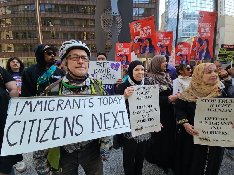 Immigrant rights advocates rally June 9, 2025 in downtown Chicago's Daley Plaza, against recent federal immigration enforcement efforts.