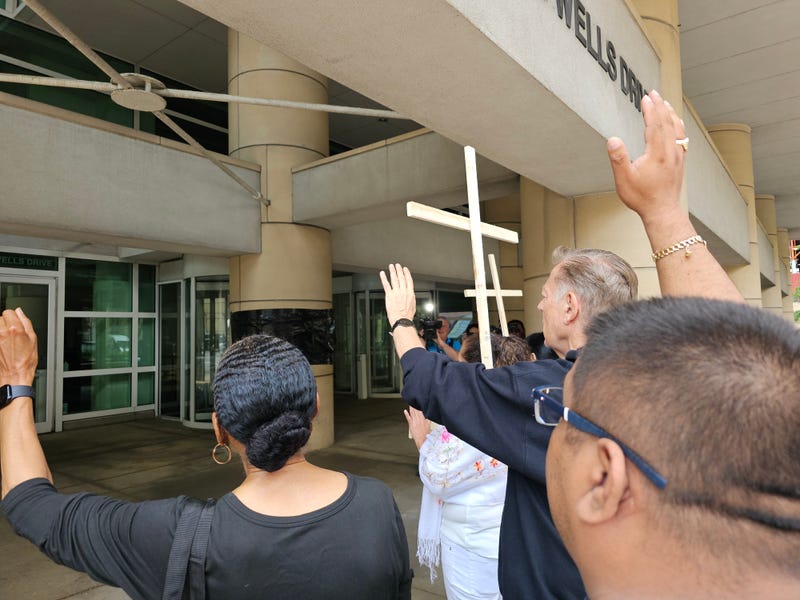 Local faith leaders hold vigil outside the ICE Chicago field office.