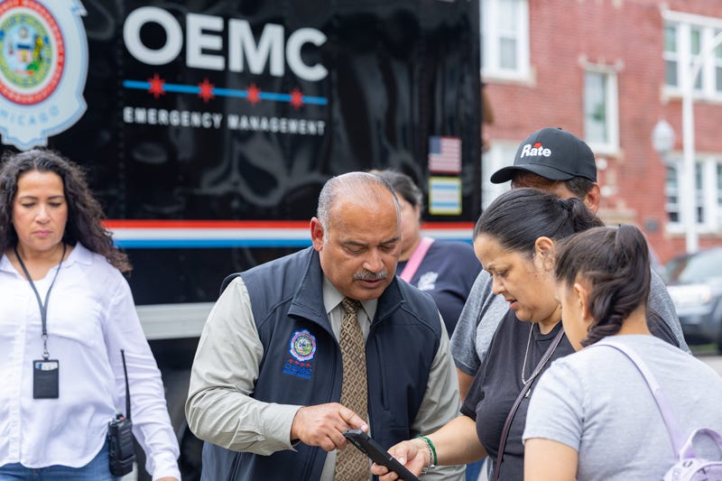 City workers talk to southwest side residents about flooding