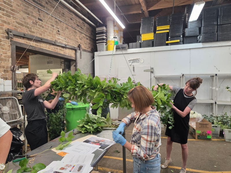 Designers create a floral halo for a client