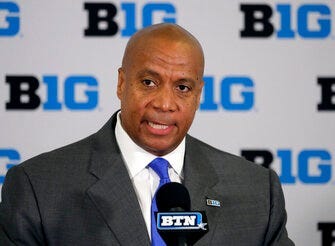 FILE - In this June 4, 2019, file photo, Kevin Warren talks to reporters after being named Big Ten Conference Commissioner during a news conference in Rosemont, Ill. (AP Photo/Charles Rex Arbogast, File)