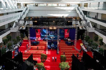 Preparations take place for the first Presidential debate in the Sheila and Eric Samson Pavilion, Monday, Sept. 28, 2020, in Cleveland. (AP Photo/Patrick Semansky)