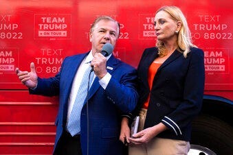 St. Louis-based lawyers Mark and Patricia McCloskey speak outside the Republican campaign office in downtown Scranton, Pa., during an appearance for a Trump campaign event. (Christopher Dolan/The Times-Tribune via AP)