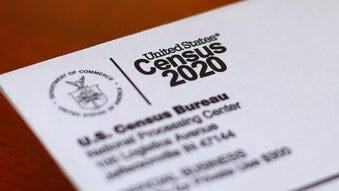 FILE - This Sunday, April 5, 2020, file photo shows an envelope containing a 2020 census letter mailed to a U.S. resident in Detroit. (AP Photo/Paul Sancya, File)
