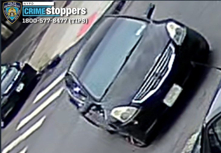 The suspect entered the driver's seat of a dark-colored Nissan Altima and struck the victim with the moving vehicle, causing the victim to fall to the ground, authorities said.
