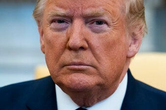 FILE - In this Jan. 27, 2020, file photo President Donald Trump listens during a meeting with Israeli Prime Minister Benjamin Netanyahu in the Oval Office of the White House. (AP Photo/ Evan Vucci)
