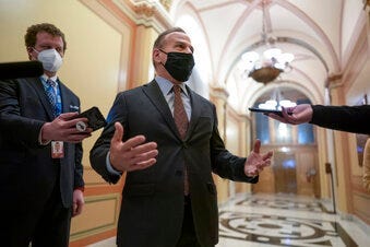 Rep. David Cicilline, D-R.I., talks to reporters just outside the House chamber after a resolution calling for the removal of President Donald Trump from office was blocked by Republicans, at the Capitol in Washington.  (AP Photo/J. Scott Applewhite)