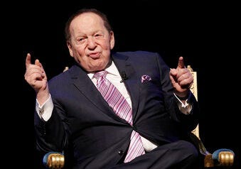 FILE - In this Sept. 13, 2016 file photo, U.S. billionaire Sheldon Adelson speaks during a news conference for the opening of Parisian Macao in Macau. (AP Photo/Kin Cheung, File)