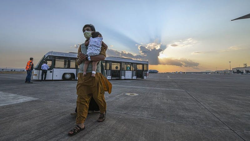 U.S. military flights take Afghan evacuees from Italy to America